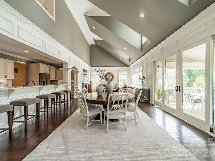 701 Copper Tree Lane, Waxhaw, NC 28173.  MLS# CAR4378056, YatesRealty ID 30870. The dining area is open to the kitchen and the covered rear porch for seamless flow. 