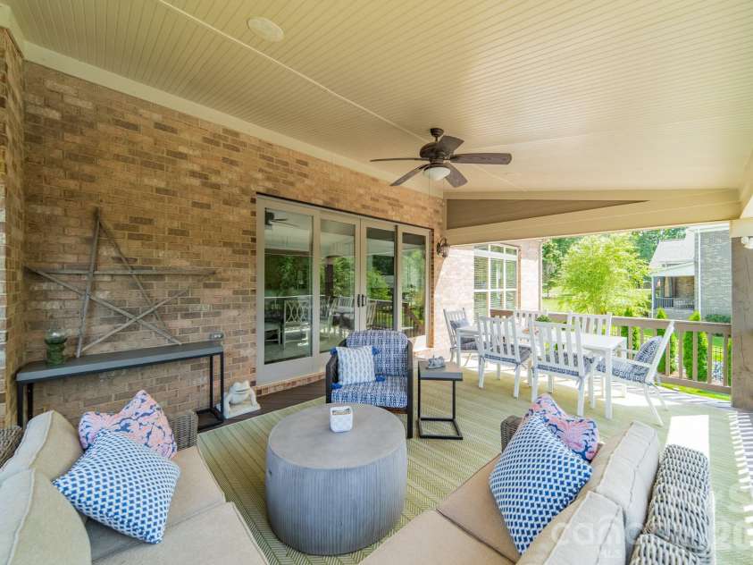 701 Copper Tree Lane, Waxhaw, NC 28173.  MLS# CAR4378056, YatesRealty ID 30870. The spacious rear porch