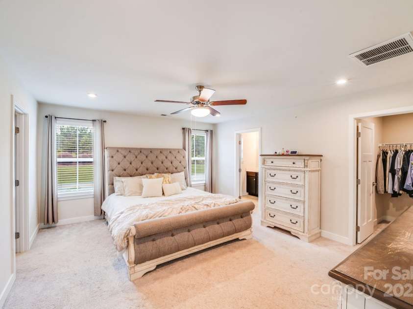 10412 Dalton Woods Court, Huntersville, NC 28078.  MLS# CAR4274231, YatesRealty ID 30871. Spacious primary bedroom