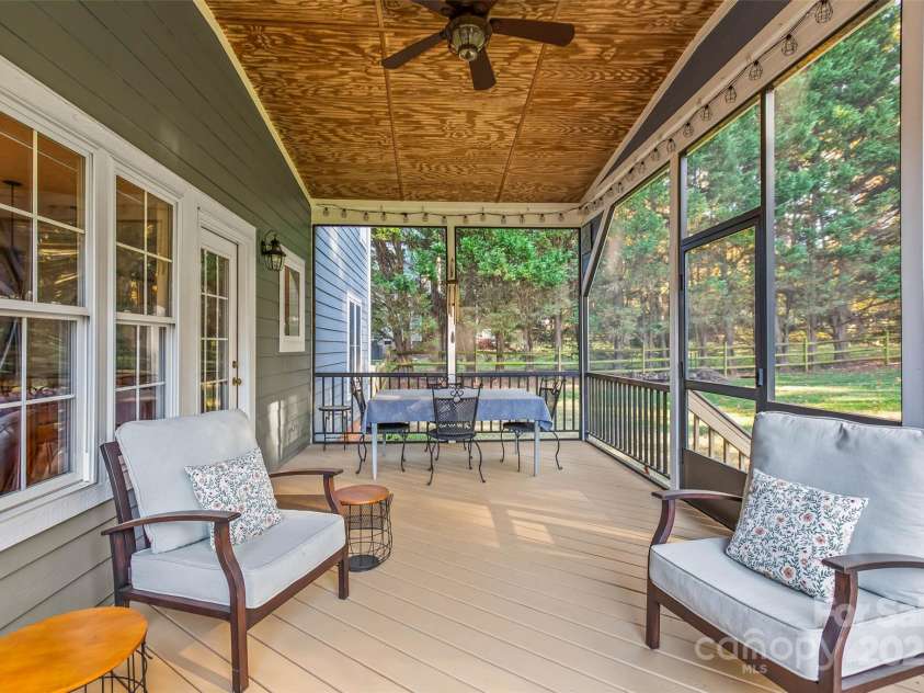 155 Huntfield Way, Mooresville, NC 28117.  MLS# CAR4332750, YatesRealty ID 30873. Entertain on the Back Screened in Porch
