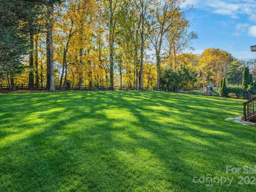 155 Huntfield Way, Mooresville, NC 28117.  MLS# CAR4332750, YatesRealty ID 30873. Lots of room for activities in the Fenced in Yard