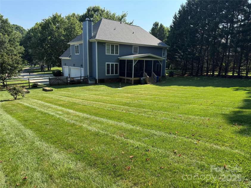 155 Huntfield Way, Mooresville, NC 28117.  MLS# CAR4332750, YatesRealty ID 30873. Sprawling Backyard