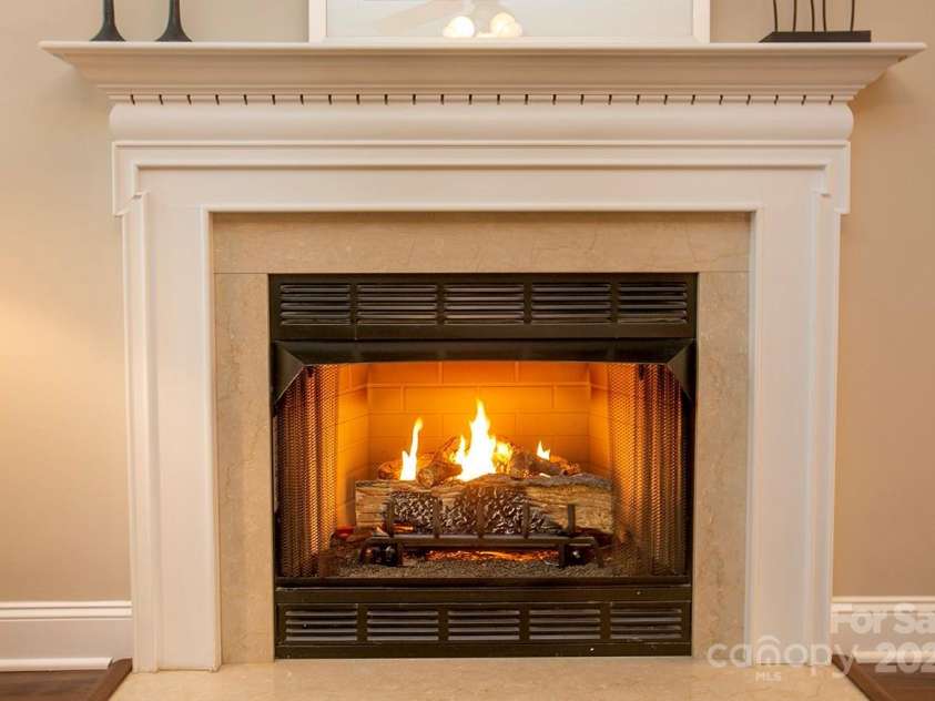 3015 Semmes Lane, Indian Trail, NC 28079.  MLS# CAR4284326, YatesRealty ID 30875. And this might well be the best gas fireplace you've ever seen.