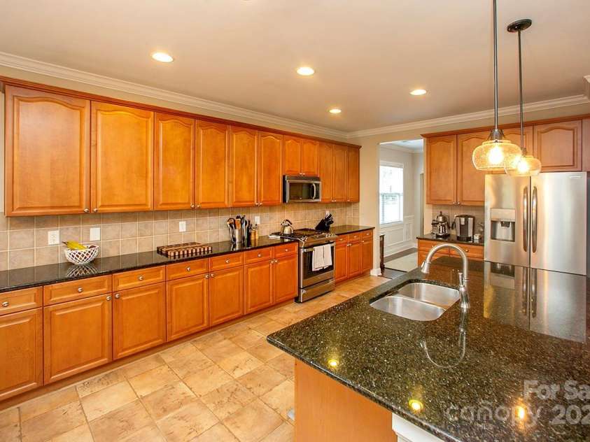 3015 Semmes Lane, Indian Trail, NC 28079.  MLS# CAR4284326, YatesRealty ID 30875. Check out the jaw-dropping amount of counterspace and cabinets in your new kitchen.