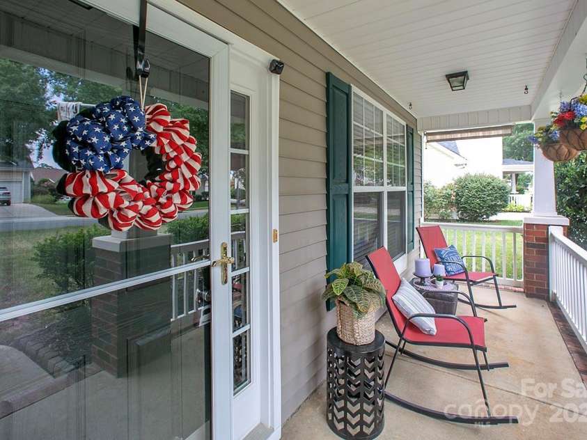 3015 Semmes Lane, Indian Trail, NC 28079.  MLS# CAR4284326, YatesRealty ID 30875. Sip wine at the end of the day and talk to the neighbors on your 17-foot covered front porch.