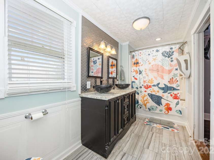 951 Helmstetler Road, Lexington, NC 27295.  MLS# CAR4276742, YatesRealty ID 30876. Secondary Primary suite bathroom with dual bowl sinks