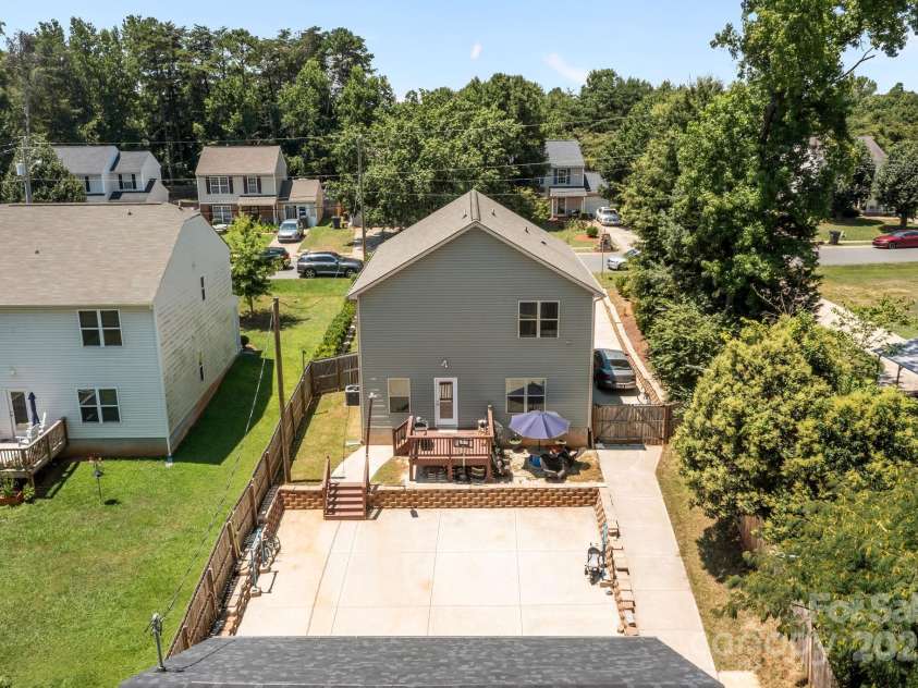 822 Lakehill Road, Charlotte, NC 28214.  MLS# CAR4285225, YatesRealty ID 30877. CONCRETE BACKYARD