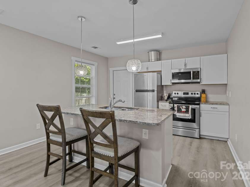 822 Lakehill Road, Charlotte, NC 28214.  MLS# CAR4285225, YatesRealty ID 30877. KITCHEN IN EXTRA DWELLING