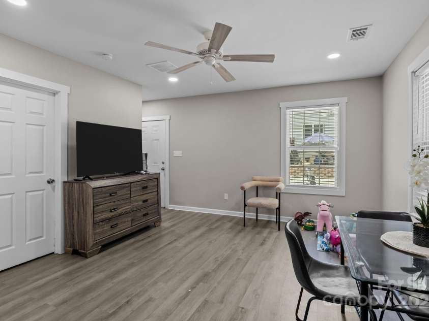 822 Lakehill Road, Charlotte, NC 28214.  MLS# CAR4285225, YatesRealty ID 30877. LIVING ROOM IN EXTRA DWELLING