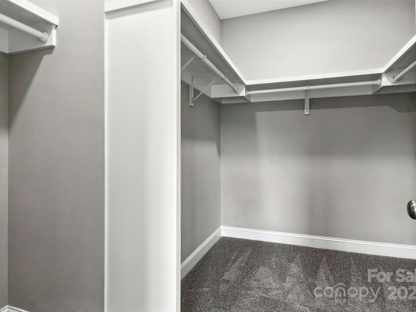 60 Westwinds Drive, Hickory, NC 28601.  MLS# CAR4286081, YatesRealty ID 30878. Primary bedroom walk in closet