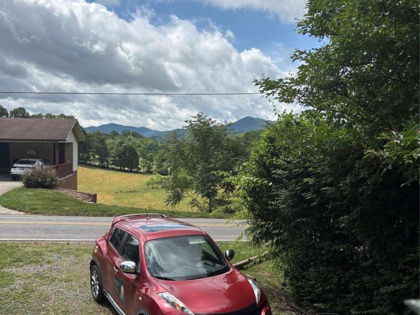 729 Don Felmet Road, Marshall, NC 28753.  MLS# CAR4386239, YatesRealty ID 30883. Front Porch View