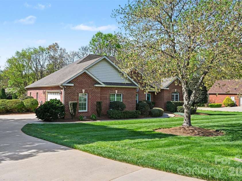 149 Howard Pond Loop, Statesville, NC 28625.  MLS# CAR4364523, YatesRealty ID 30884. Side load garage with extra parking