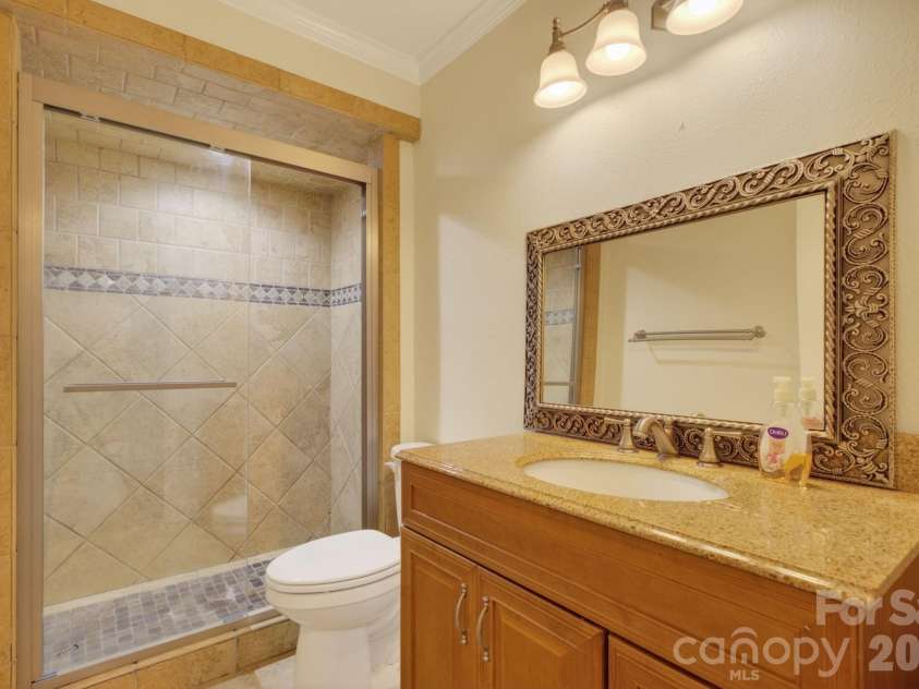97 Whippoorwill Lane, Fairview, NC 28730.  MLS# CAR4377999, YatesRealty ID 30887. Bathroom 3 in lower level
