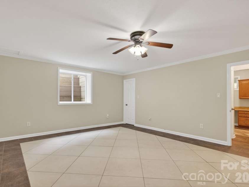 97 Whippoorwill Lane, Fairview, NC 28730.  MLS# CAR4377999, YatesRealty ID 30887. Lower level bedroom 4