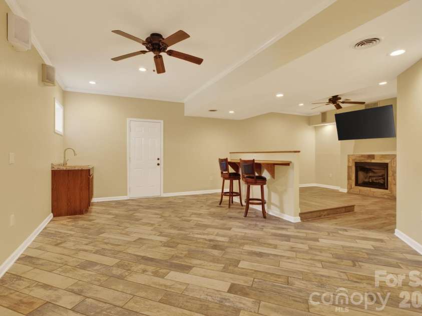 97 Whippoorwill Lane, Fairview, NC 28730.  MLS# CAR4377999, YatesRealty ID 30887. Lower level with wet bar