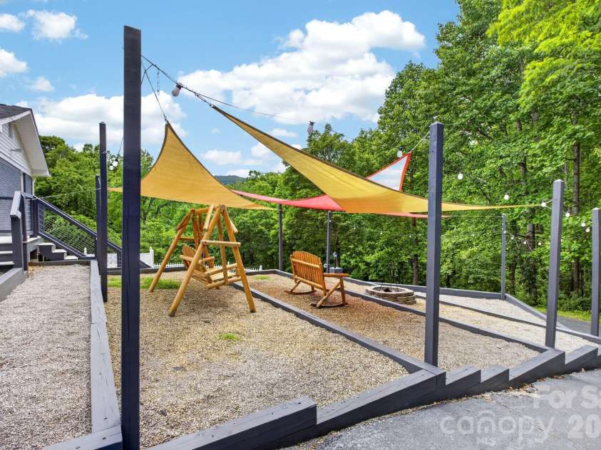 97 Whippoorwill Lane, Fairview, NC 28730.  MLS# CAR4377999, YatesRealty ID 30887. Sit back and relax by a cozy fire
