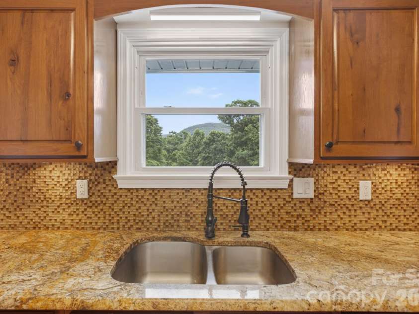 97 Whippoorwill Lane, Fairview, NC 28730.  MLS# CAR4377999, YatesRealty ID 30887. View from kitchen window