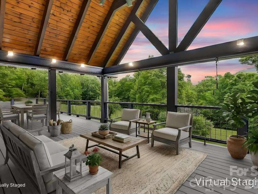 97 Whippoorwill Lane, Fairview, NC 28730.  MLS# CAR4377999, YatesRealty ID 30887. Virtually staged timber frame deck