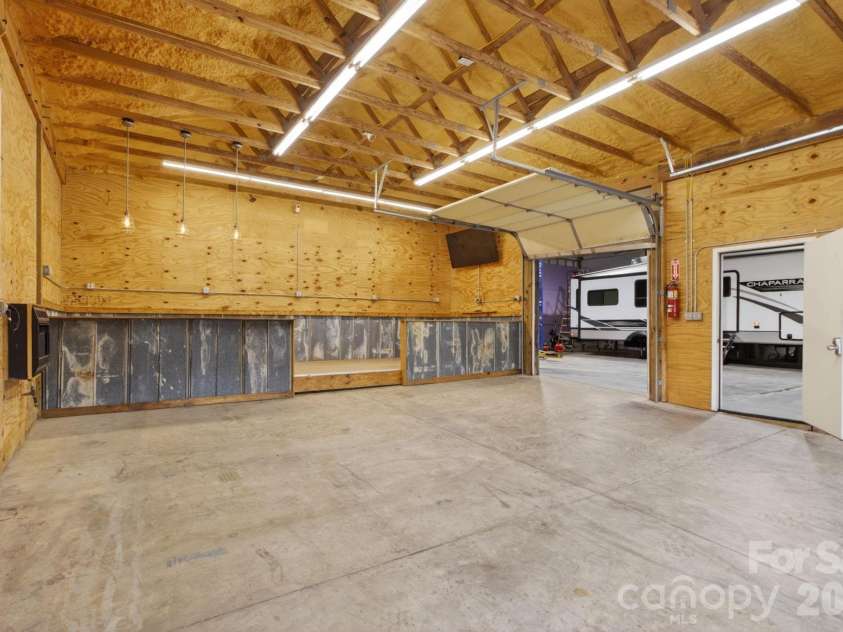 97 Whippoorwill Lane, Fairview, NC 28730.  MLS# CAR4377999, YatesRealty ID 30887. Work shop 1 with man cave