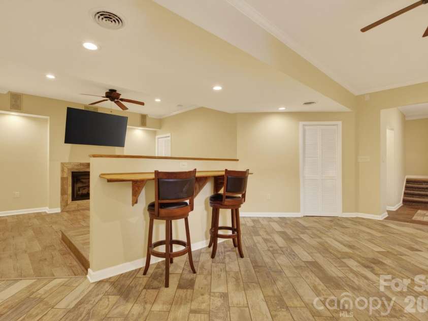 97 Whippoorwill Lane, Fairview, NC 28730.  MLS# CAR4402332, YatesRealty ID 30887. Media room