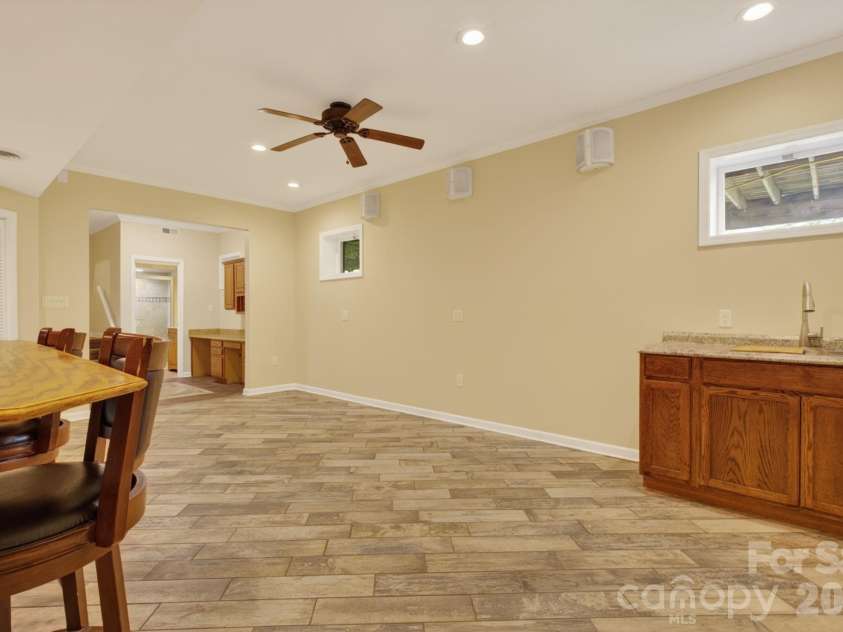 97 Whippoorwill Lane, Fairview, NC 28730.  MLS# CAR4402332, YatesRealty ID 30887. Wet bar area lower level