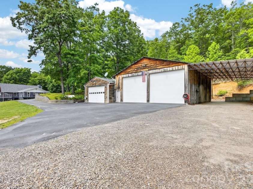 97 Whippoorwill Lane, Fairview, NC 28730.  MLS# CAR4402332, YatesRealty ID 30887. Work shops