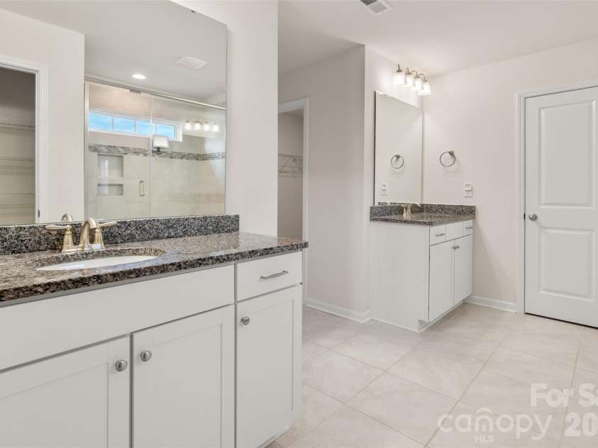 2015 Saddlebred Drive, Iron Station, NC 28080.  MLS# CAR4338671, YatesRealty ID 3089. Owner's Private Bath