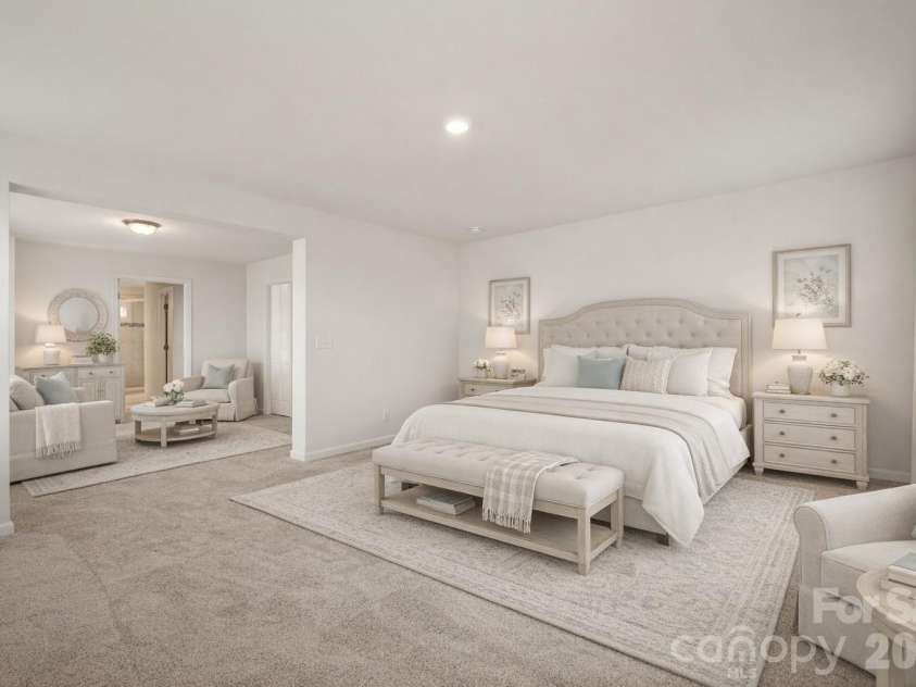 2015 Saddlebred Drive, Iron Station, NC 28080.  MLS# CAR4338671, YatesRealty ID 3089. Owner's Suite with sitting room, private bath and walk in closet-Virtually Staged