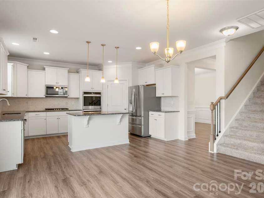 2015 Saddlebred Drive, Iron Station, NC 28080.  MLS# CAR4338671, YatesRealty ID 3089. Stairwell to 2nd level