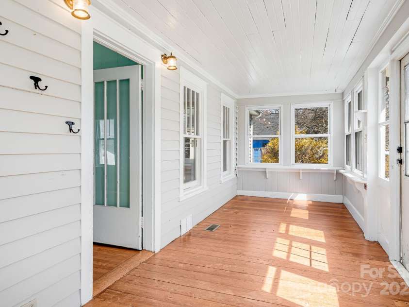 4243 Old Clyde Road, Clyde, NC 28721.  MLS# CAR4234400, YatesRealty ID 3089. Entry &Enclosed Front Porch Area