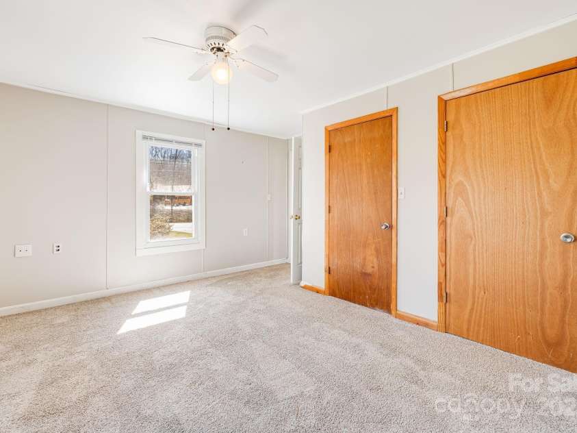 4243 Old Clyde Road, Clyde, NC 28721.  MLS# CAR4234400, YatesRealty ID 3089. Primary Bedroom