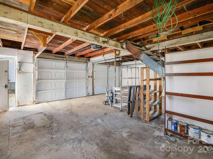 4243 Old Clyde Road, Clyde, NC 28721.  MLS# CAR4234400, YatesRealty ID 3089. Walk up storage in Garage