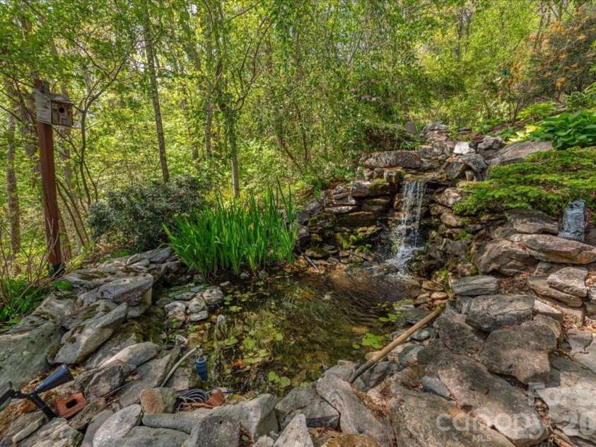 1108 Rocky Knob Road, Waynesville, NC 28786.  MLS# CAR4371644, YatesRealty ID 30890. Water feature