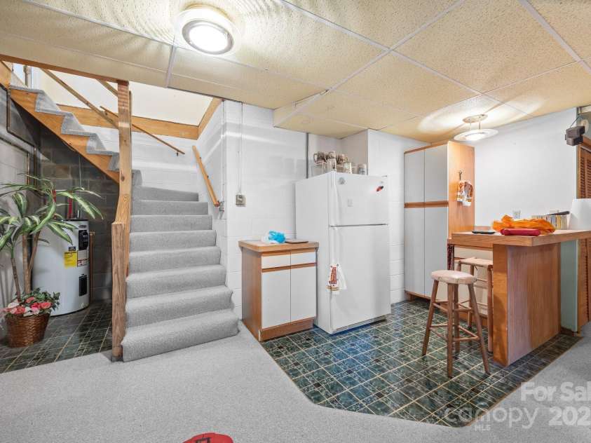 840 Deer Lake Run, Salisbury, NC 28146.  MLS# CAR4279838, YatesRealty ID 30890. Small snack area down stairs, The sink is not plumbed, No fixtures are on the sink- Your opportunity to make it your own!