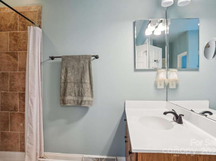 134 Lake Spring Loop, Mooresville, NC 28117.  MLS# CAR4307045, YatesRealty ID 30892. Primary Tile Shower