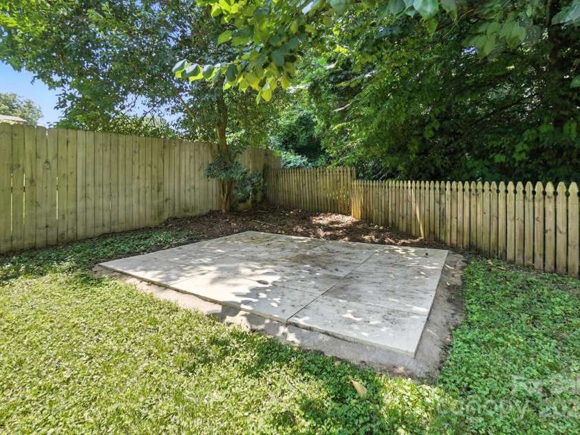 2528 Arnold Drive, Charlotte, NC 28205.  MLS# CAR4277706, YatesRealty ID 30895. Fire pit area