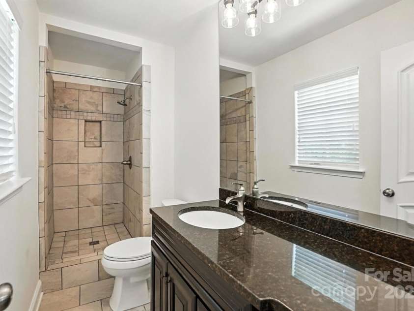 2528 Arnold Drive, Charlotte, NC 28205.  MLS# CAR4277706, YatesRealty ID 30895. Primary bath