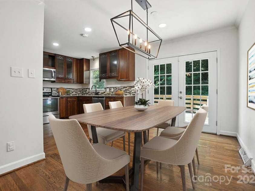 2528 Arnold Drive, Charlotte, NC 28205.  MLS# CAR4277706, YatesRealty ID 30895. Virtually staged dining
