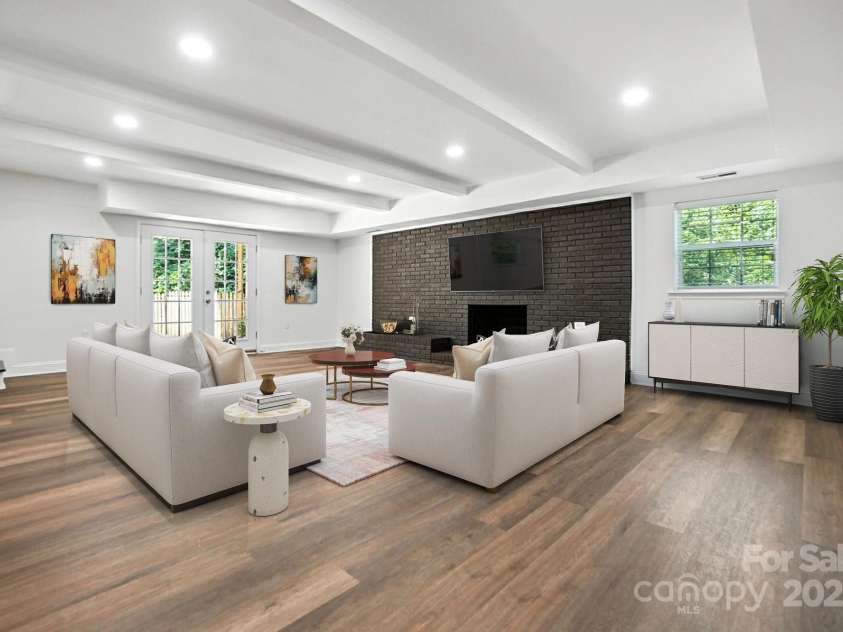 2528 Arnold Drive, Charlotte, NC 28205.  MLS# CAR4277706, YatesRealty ID 30895. Virtually staged family room downstairs