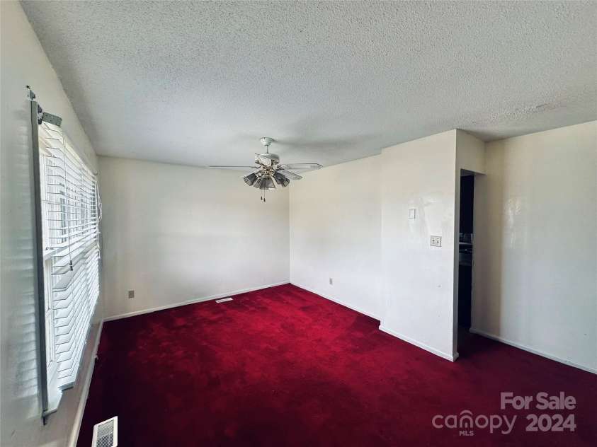 612 Dr Martin Luther King Jr Avenue, Enfield, NC 27823.  MLS# CAR4145152, YatesRealty ID 309. Living Room/Family Room