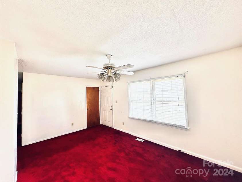 612 Dr Martin Luther King Jr Avenue, Enfield, NC 27823.  MLS# CAR4145152, YatesRealty ID 309. Living Room/Family Room