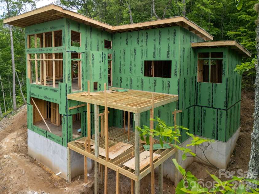 670 Southshore Drive, Tuckasegee, NC 28783.  MLS# CAR4390228, YatesRealty ID 30903. 