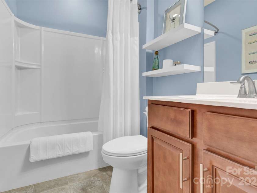 7028 Kitty Hawk Lane, Fort Mill, SC 29707.  MLS# CAR4285011, YatesRealty ID 30903. Full Bath downstairs.
