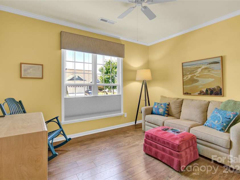 7028 Kitty Hawk Lane, Fort Mill, SC 29707.  MLS# CAR4285011, YatesRealty ID 30903. Near the front of the house is the Guest Bedroom on main level.