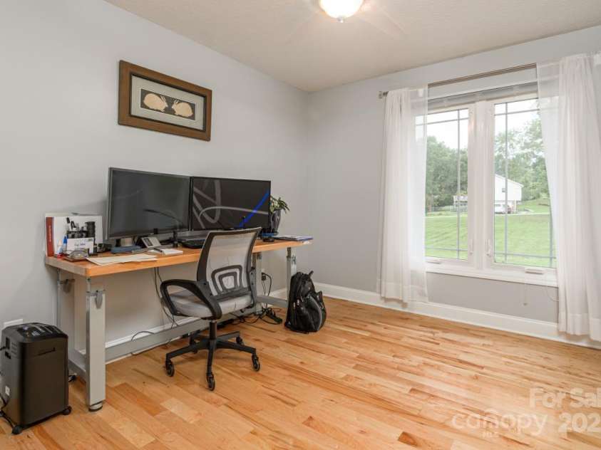 231 Kimberly Ann Drive, Hendersonville, NC 28792.  MLS# CAR4285461, YatesRealty ID 30905. Third bedroom, currently a home office
