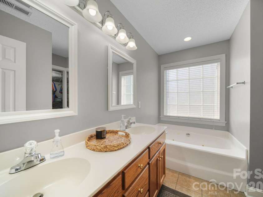3804 Secrest Shortcut Road, Monroe, NC 28110.  MLS# CAR4390546, YatesRealty ID 30908. Primary Bathroom