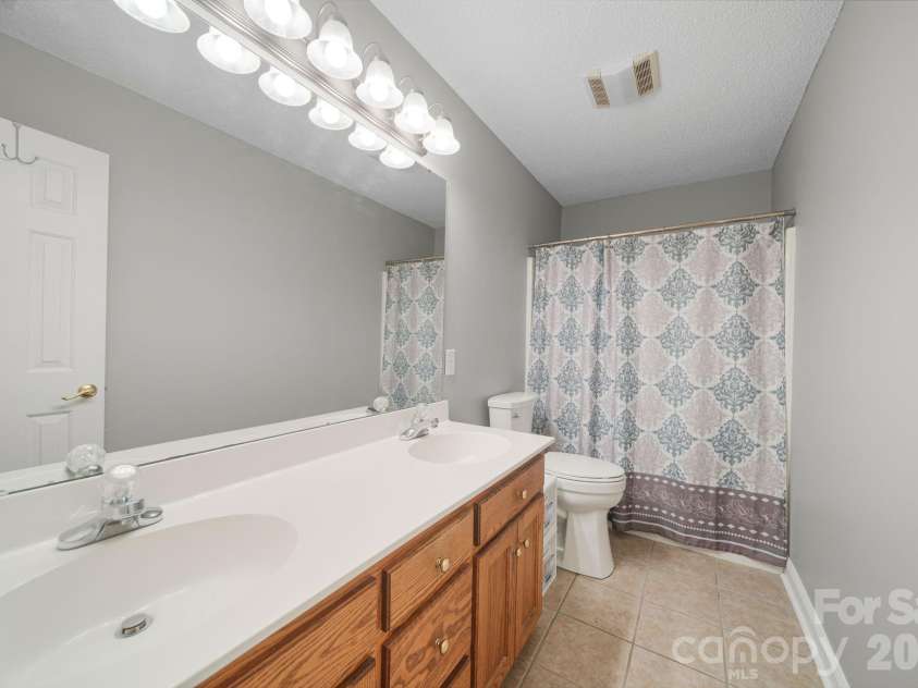 3804 Secrest Shortcut Road, Monroe, NC 28110.  MLS# CAR4390546, YatesRealty ID 30908. Secondary Bathroom
