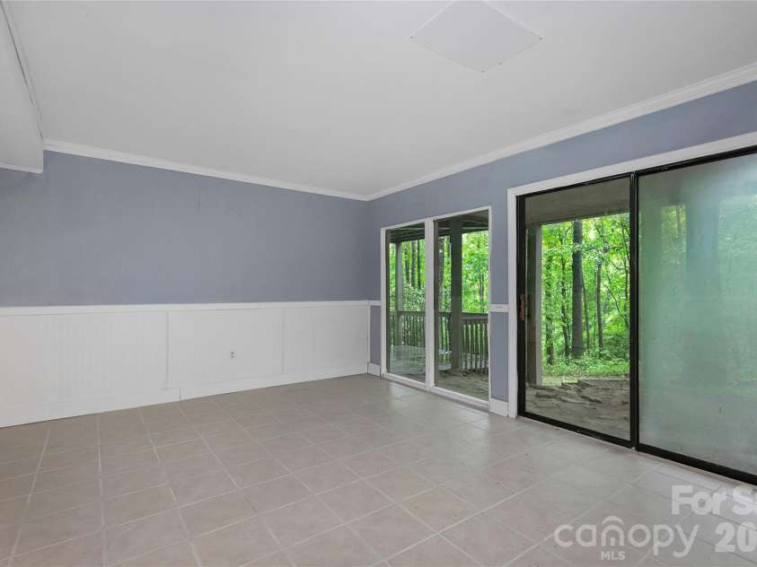 56 Guque Court, Brevard, NC 28712.  MLS# CAR4391612, YatesRealty ID 30909. Bonus Room in Basement without Virtual Staging