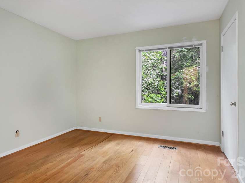 56 Guque Court, Brevard, NC 28712.  MLS# CAR4391612, YatesRealty ID 30909. Main Floor Guest Room without Virtual Staging.