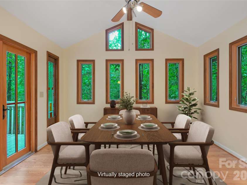 56 Guque Court, Brevard, NC 28712.  MLS# CAR4391612, YatesRealty ID 30909. This is showing on the floorplan as a den, but would make a perfect Dining Room. 